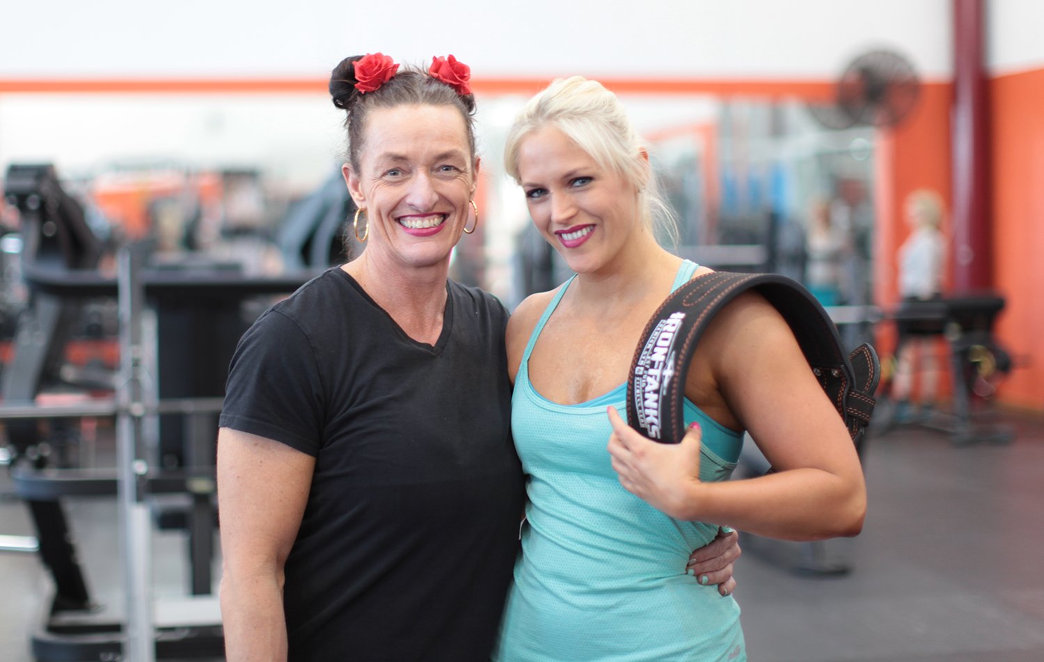 Geelong's experienced personal trainer Ingrid Barclay and client Leah in gym gear hugging